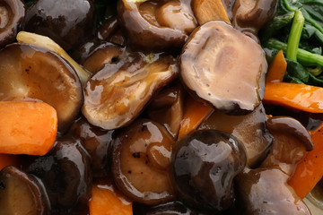Chinese food. Fried mushrooms with vegetables