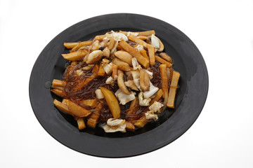 Chinese food. Fried potato chips in sauce