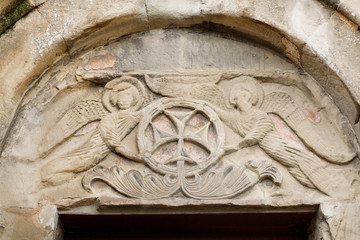 Relief with angels and cross on Jvari Monastery, 6th century in Mtskheta, Georgia. World Heritage site by UNESCO