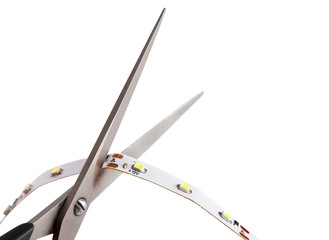 LED Light Strip Cut At Copper Contacts, using household scissors