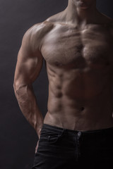 Fototapeta na wymiar man bodybulider close up, abs core chest arms biceps.