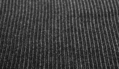 Black knitted wool background and texture
