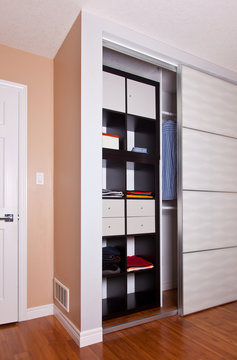 Built-in Closet With Sliding Door Shelving Storage Organization