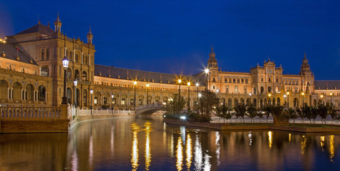 Fototapeta na wymiar Seville - The canal on the Plaza de Espana square designed by An