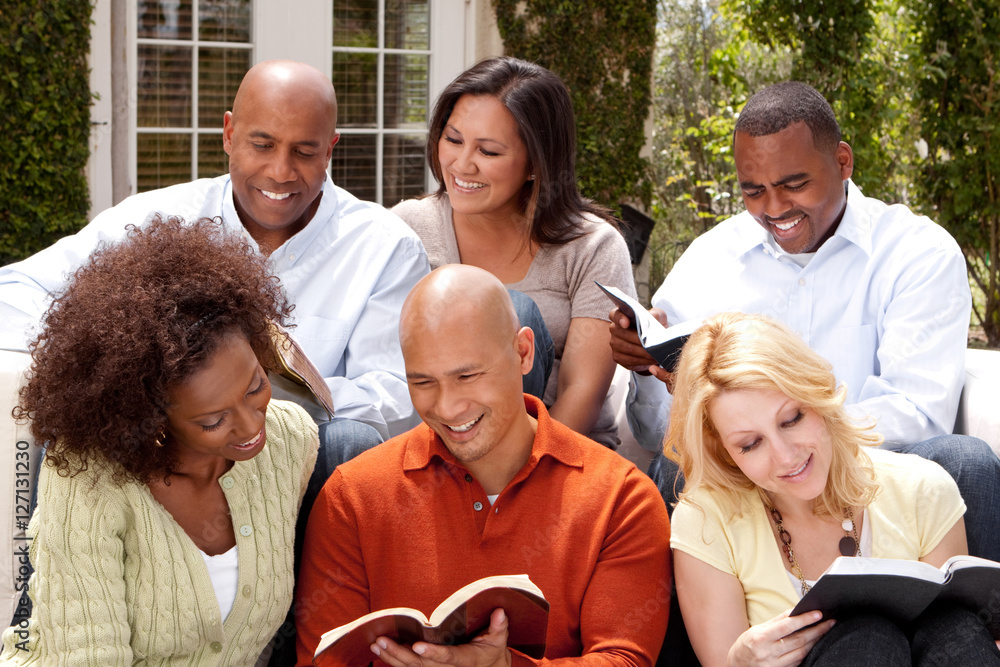 Wall mural bible study with a diverse group of friends.