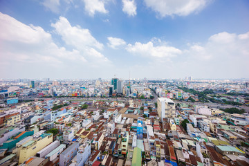 Ho Chi Minh city (or Saigon) skyline, Vietnam. Ho Chi Minh city (aka Saigon) is the largest city and economic center in Vietnam with population around 10 million people.