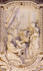 ROME, ITALY - MARCH 10, 2016: The relief of scene from life of Apostle in church Basilica di San Marco designs by Clemente Orlandi (1741).