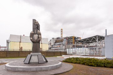 Obraz premium Chernobyl Exclusion Zone, Ukraine. view on fourth power generating unit. Resquers memorian near the Nuclear Energy Plant