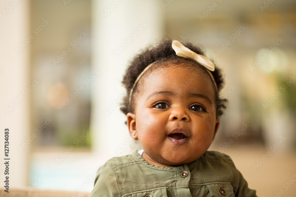 Wall mural cute baby girl.