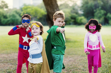 Fototapeta na wymiar Superheroes Cheerful Kids Expressing Positivity Concept