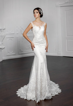 Beautiful bride in fashion wedding dress with diamond jewelry 