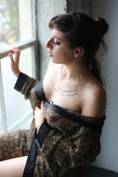 Young Woman in Sexy Silk Rober