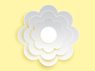 Hand Cut Paper Art is white flower on yellow background 