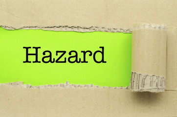 Torn Paper with word Hazard