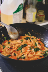 Cooking Thai Chicken Red Curry in the Wok, Thai Food, Thai Cuisi