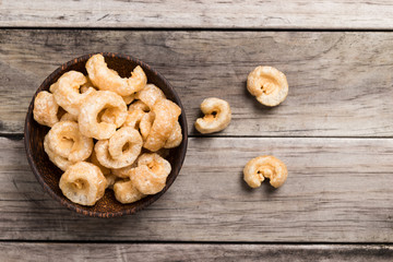 Pork rinds also known as chicharon or chicharrones, deep fried p