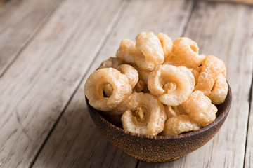 Pork rinds also known as chicharon or chicharrones, deep fried p