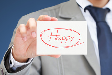 Businessman hand holding card with happy message.