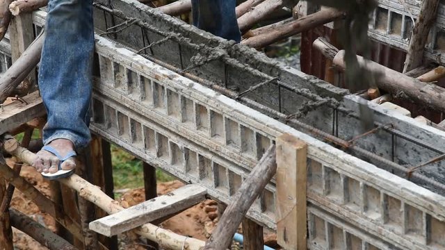 Concrete pouring during commercial concreting floors of buildings in construction(Commercial Building)
