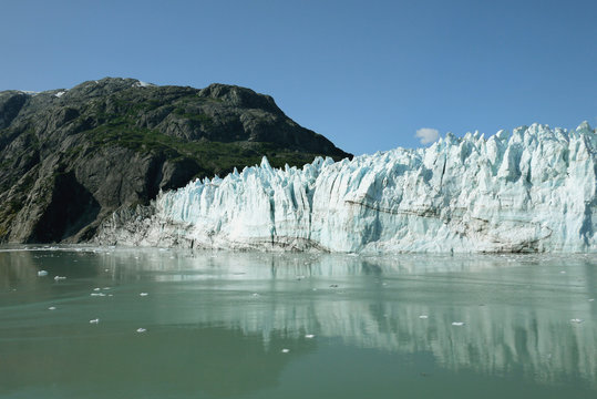 tidewater glacier glistening in the sunlight in Glacier Bay national Park Alaska