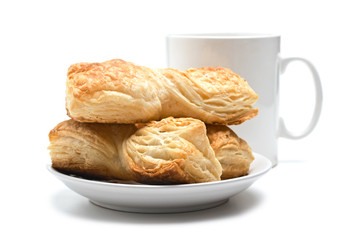 cookies on a plate and cup
