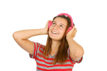 Obraz na płótnie Canvas happy girl teen in pink headphones