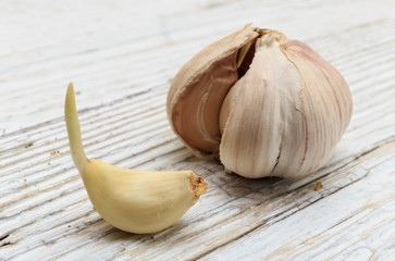 Garlic on a white wooden board