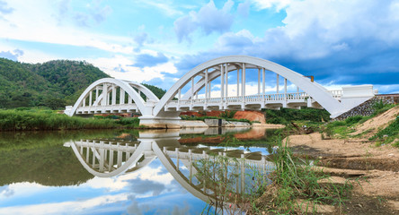 White bridge backdrop blue sky at mae tha, Lamphun, Thailand.