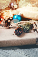 Gift handmade decorated fir branch with cone