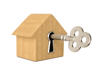 Wooden house with key in keyhole