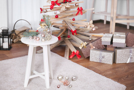 Table with Christmas decoration in living room