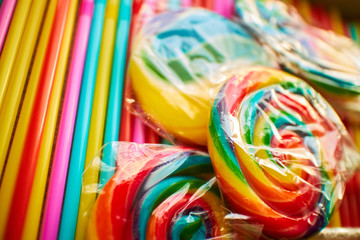 Fototapeta na wymiar multicolored cocktail sticks and lollipops