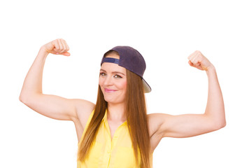 Obraz na płótnie Canvas Girl showing her muscles