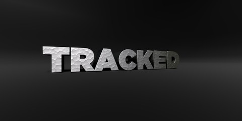 TRACKED - hammered metal finish text on black studio - 3D rendered royalty free stock photo. This image can be used for an online website banner ad or a print postcard.