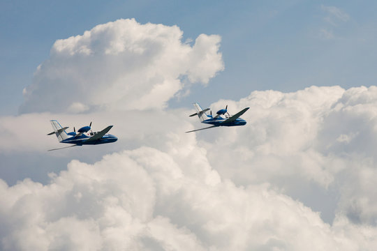  pair of the  Flying airplane Be-103 in clouds
