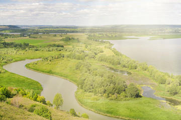 Green river valley in the sunlight