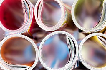 Close up edge of colorful magazine stacking roll 