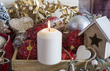 Fototapeta na wymiar Flaming Christmas candle