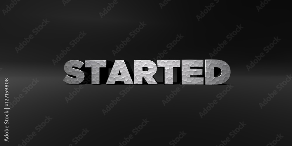 Fototapete started - hammered metal finish text on black studio - 3d rendered royalty free stock photo. this im