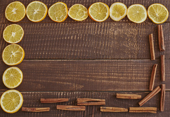 Cinnamon sticks with lemon slices