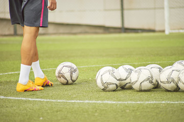 male palyer preparing in soccer shooting drill