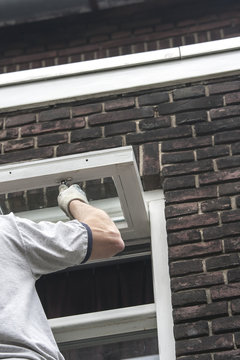 Painter preparing wood