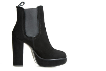 Female black boots isolated on a white background.