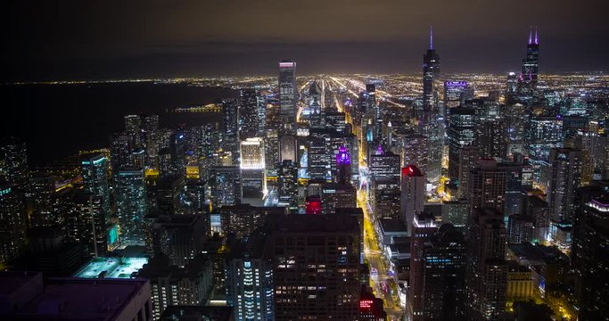 Chicago, Illinois, USA - view from John Hancock Center of City with Willis Tower (formerly Sears Tower), Tribune Tower and NBC Tower facing south at night - Timelapse without motion