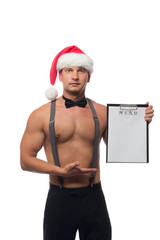 Bartender with a naked torso in a red cap holding a menu