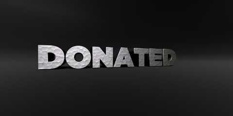 DONATED - hammered metal finish text on black studio - 3D rendered royalty free stock photo. This image can be used for an online website banner ad or a print postcard.