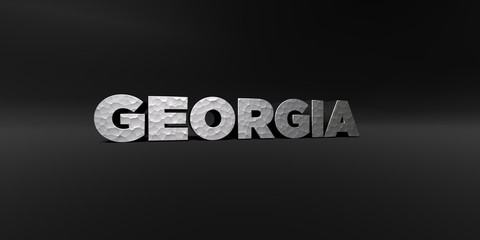 GEORGIA - hammered metal finish text on black studio - 3D rendered royalty free stock photo. This image can be used for an online website banner ad or a print postcard.
