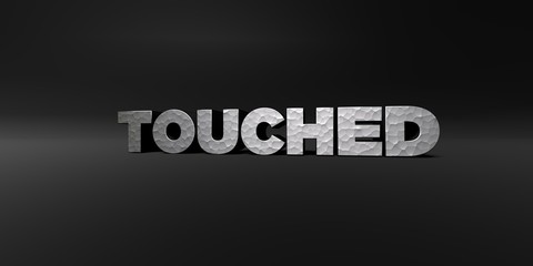 TOUCHED - hammered metal finish text on black studio - 3D rendered royalty free stock photo. This image can be used for an online website banner ad or a print postcard.