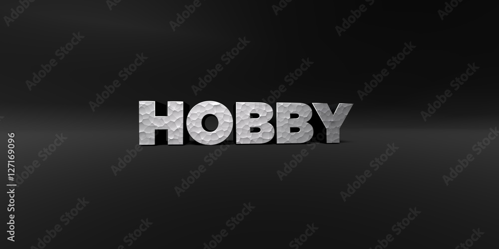 Fototapete hobby - hammered metal finish text on black studio - 3d rendered royalty free stock photo. this imag