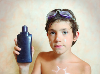 preteen boy with anti sunburn cream © ulianna19970